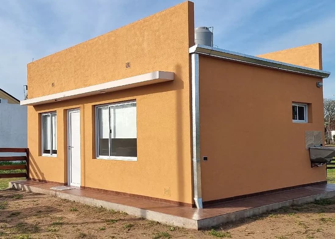 Kusi, cabañas en Pueblo Liebig